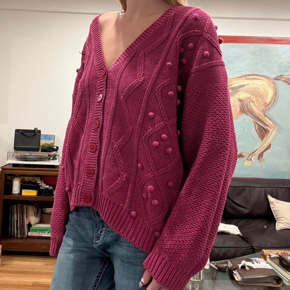 Pink knit cardigan sweater